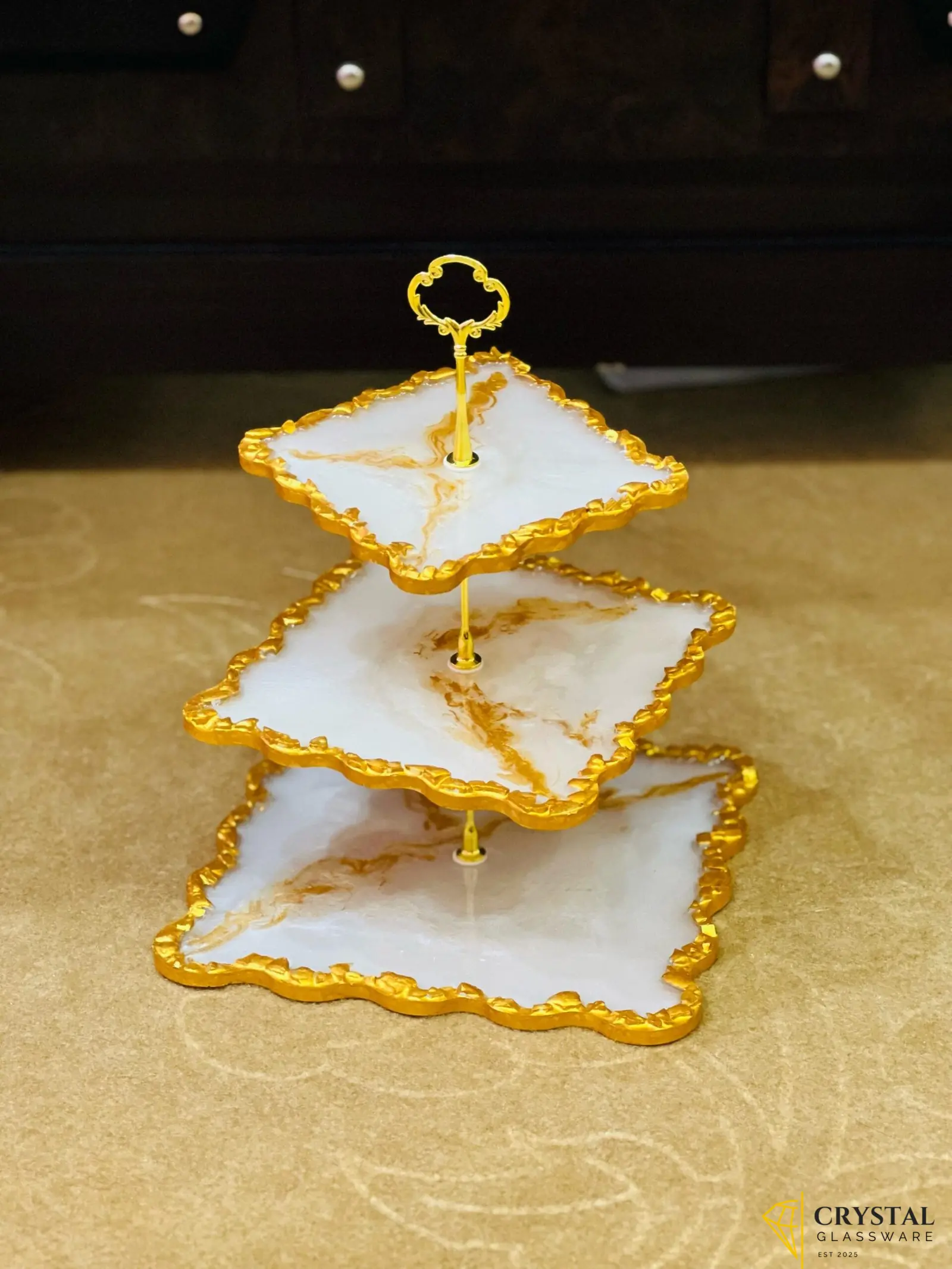 3-tier white ceramic cake stand with gold accents